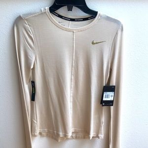 NWT Beautiful NIKE Running slim fit top with white and golden beige tan tones